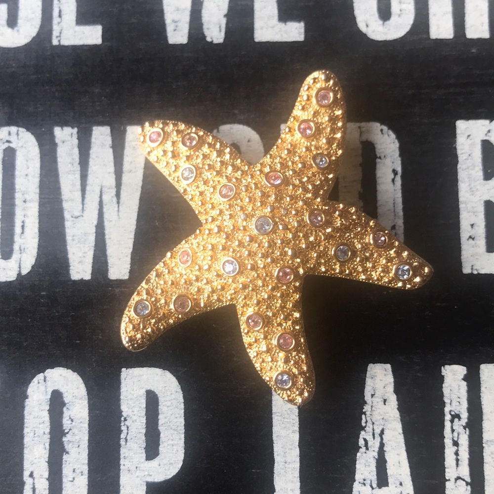 Swarovski beautiful brooch.